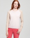 Inspired by a classic baseball tee, this heavenly-soft cashmere Theory sweater, features color blocked raglan sleeves for a luxurious incarnation of a sporty classic.