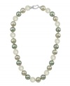 Serene colors modernize a classic. Majorica's sterling silver necklace features lustrous multicolor organic man-made pearls (12 mm). Approximate length: 17 inches.