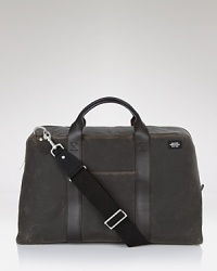 A modern take on the duffle, this Jack Spade duffle bag in rugged waxed cotton exudes getaway cool. A modern take on the duffle, this Jack Spade duffle bag in rugged waxed cotton exudes getaway cool.