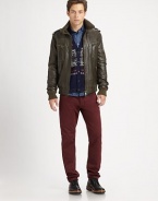 A butter-soft Italian leather jacket with military-inspired epaulettes, ribbed-knit trim and a plethora of zipper pockets.Stand collarFront zipperEpaulettesZippered pocketsRibbed-knit detailsBack yokeAbout 27 from shoulder to hemLeatherDry clean by leather specialistImported of Italian fabric
