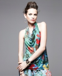 A bold print adds an irreverent appeal to this Neon halter top for standout style! A bold print adds an irreverent appeal to this Neon halter top for standout style!