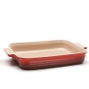 Ideal for cooking and serving, this durable stoneware dish features sure-grip handles for maximum portability. With low sides and a rectangular shape, it can be used in the oven, broiler or microwave for everything from lasagna to peach cobblers without absorbing flavors or odors.