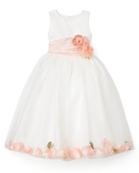 The Petal dress from US Angels is perfect for a party or a formal affair, with its flowing skirt and wide ribbon sash with flower detail at waist. The Petal dress from US Angels is perfect for a party or a formal affair, with its flowing skirt and wide ribbon sash with flower detail at waist.
