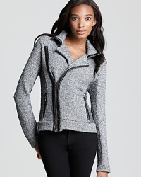 The traditional tweed jacket unzipped and revamped for cutting-edge style delivered by Aqua Luxe. The traditional tweed jacket unzipped and revamped for cutting-edge style delivered by Aqua Luxe.