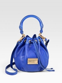 This versatile design of rich leather is cinched at the top, finished with a signature logo plaque. Top handle, 5½ dropAdjustable detachable shoulder strap, 18½-22 dropDrawstring closureFully lined6W X 8H X 6DImported This versatile design of rich leather is cinched at the top, finished with a signature logo plaque. Top handle, 5½ dropAdjustable detachable shoulder strap, 18½-22 dropDrawstring closureFully lined6W X 8H X 6DImported