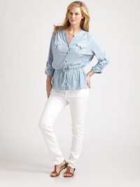 A simple button-down shirt offering you exquisite arm coverage, a comfortable, drawstring waist and a relaxed, undeniably flattering fit.Split collarRoll-tab sleevesFront pocketsButton frontDrawstring waistBack yokeAbout 26 from shoulder to hemCottonMachine washImported