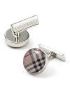 Round beat check cufflinks with brass clasp closure. Signature stamped at back.
