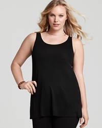 Effortlessly layered under draped cardigans and fitted blazers or simply worn on its own, this Eileen Fisher silk jersey tunic is a standout year-round essential. Effortlessly layered under draped cardigans and fitted blazers or simply worn on its own, this Eileen Fisher silk jersey tunic is a standout year-round essential.