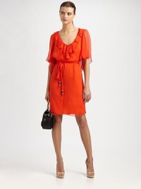 Effortlessly elegant silk dress styled with ruffle trim, semi-sheer flutter sleeves and a self tie at the waist. Ruffled roundneckThree-quarter flutter sleevesSelf tie at waistAbout 19 from natural waistSilkDry cleanMade in USA of imported fabricModel shown is 5'9½ (176cm) wearing US size 2. Effortlessly elegant silk dress styled with ruffle trim, semi-sheer flutter sleeves and a self tie at the waist. Ruffled roundneckThree-quarter flutter sleevesSelf tie at waistAbout 19 from natural waistSilkDry cleanMade in USA of imported fabricModel shown is 5'9½ (176cm) wearing US size 2.