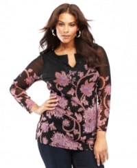 A scrolling vine print climbs up INC's beaded plus size tunic, creating an exotic look with a romantic feel. A scrolling vine print climbs up INC's beaded plus size tunic, creating an exotic look with a romantic feel.