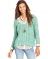 Allover open stitching lends a modern appeal to this Free People cable knit sweater -- a hot layering piece!