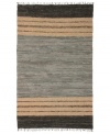 Olé! Spice up your decor with the gorgeously festive style of the Matador rug from St. Croix. Durable leather strips in elegant grey and cream hues are meticulously hand woven with fine cotton strands, resulting in a beautiful, rustic texture and natural braided pattern that accents even the most eclectic decor.