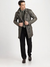 Double-breasted coat with trench-style aesthetics, featuring shoulder epaulettes and buckle closure at the collar, finished in a burnished leather, for an uptown meets downtown feel.Double-breasted button-frontShoulder epaulettesBelted waistRear ventFully linedAbout 36 from shoulder to hemLeatherDry cleanImported Double-breasted coat with trench-style aesthetics, featuring shoulder epaulettes and buckle closure at the collar, finished in a burnished leather, for an uptown meets downtown feel.Double-breasted button-frontShoulder epaulettesBelted waistRear ventFully linedAbout 36 from shoulder to hemLeatherDry cleanImported