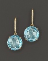 Pavé diamonds and sky blue topaz sparkle in an 18K yellow gold setting.