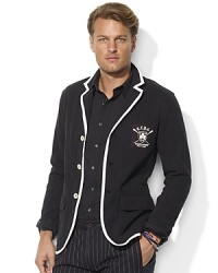 Preppy style meets luxurious comfort in this supremely lightweight cotton jersey blazer, finished with contrast piping and an embroidered crest for a heritage appeal.