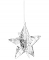 Star bright. The Christmas Moonlight Star ornament brings new brilliance to modern holidays, combining the gleam of Swarovski crystal with goldtone metal and sparkling chatons.