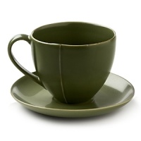 Borrowing from nature, these porcelain cups and saucers have a highly glossed surface and unusual contours, creating an interesting silhouette - a DVF signature - on the table. Borrowing from nature, these porcelain cups and saucers have a highly glossed surface and unusual contours, creating an interesting silhouette - a DVF signature - on the table.