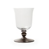 Mouth-blown by artisans in the hills outside Prague, this faceted goblet sits atop a regal hand-painted platinum stem.