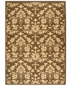 Safavieh takes classic beauty outside of the home with this elegant rug, created with a specially designed sisal weave. In deep chocolate brown with natural accents, this beautiful piece makes the most of any outdoor patio, porch or balcony. (Clearance)