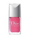 Never before has the color of Dior Vernis displayed such lacquered and vibrant shine! A cocktail of Shine and Sparkle Amplifying active ingredients directs pigments and pearly particles to enhance light reflection tenfold. Once again, the array of enchanting shades created by Tyen reflect the spirit of Dior fashion shows.Application is even easier with the brush. Dior Vernis also features a newchip-resistant formula that protects and embellishes the nails, day after day.