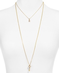 Unlock sweet yet simple style with this layered charm necklace from Juicy Couture. Unlock sweet yet simple style with this layered charm necklace from Juicy Couture.