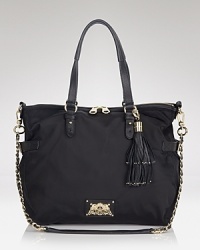 This nylon Juicy Couture satchel is trimmed in lightly textured leather and styled with a top zip closure. This nylon Juicy Couture satchel is trimmed in lightly textured leather and styled with a top zip closure.