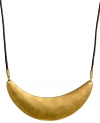 Exotic appeal. Kenneth Cole New York's modern and stylish crescent moon pendant is crafted in gold tone mixed metal and strung from a brown waxed cotton cord. Approximate length: 17 inches + 3-inch extender. Exotic appeal. Kenneth Cole New York's modern and stylish crescent moon pendant is crafted in gold tone mixed metal and strung from a brown waxed cotton cord. Approximate length: 17 inches + 3-inch extender.