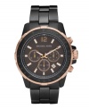 Rose-gold accents warm up this handsome, blacked-out watch by Michael Kors.