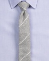 Simple elegance rendered in diagonal striped Italian wool.About 2½ wideWoolDry cleanImported of Italian fabric