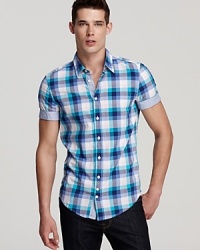 This vibrant check shirt features a touch of designer innovation with a solid contrast interior placket and inner sleeve edge. This vibrant check shirt features a touch of designer innovation with a solid contrast interior placket and inner sleeve edge.