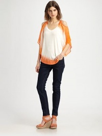 A silky-smooth top with feminine sleeves, dipped in a contrasting tone for a watercolor effect. V-neckCutout shouldersThree-quarter butterfly sleevesSilkContrast: 96% modal/4% spandexDry cleanMade in USAModel shown is 5'10 (177cm) wearing US size Small. A silky-smooth top with feminine sleeves, dipped in a contrasting tone for a watercolor effect. V-neckCutout shouldersThree-quarter butterfly sleevesSilkContrast: 96% modal/4% spandexDry cleanMade in USAModel shown is 5'10 (177cm) wearing US size Small.