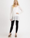 A lightweight, knit top featuring a gorgeous wave pattern that will inevitably turn heads. ScoopneckLong sleevesPull-on styleAbout 30 from shoulder to hem53% cotton/25% linen/22% nylonHand washImported of Italian fabric Model shown is 5'10 (177cm) wearing US size Small. 