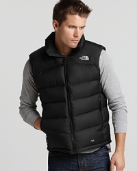 Superior cold weather layering is here with the sporty The North Face® down vest, featuring a protective funnel collar and cinchcord hem.