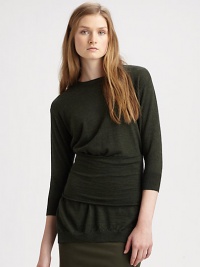 An understated classic, this fine-knit wool sweater has an exaggerated waistband, split hem and a bold back zipper. RoundneckDropped shouldersThree-quarter sleevesWide waistbandSplit hemExposed back zipperWoolDry cleanImportedModel shown is 5'10 (177cm) wearing US size Small. An understated classic, this fine-knit wool sweater has an exaggerated waistband, split hem and a bold back zipper. RoundneckDropped shouldersThree-quarter sleevesWide waistbandSplit hemExposed back zipperWoolDry cleanImportedModel shown is 5'10 (177cm) wearing US size Small.
