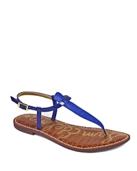 Slender, strappy thong sandals pack a colorful punch; by Sam Edelman. Slender, strappy thong sandals pack a colorful punch; by Sam Edelman.