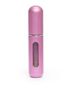 Travel size atomizer, simply remove the head from the perfume bottle. Position the atomizer in its place and pump.