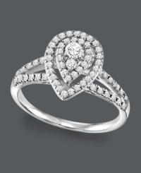 Unique style for a remarkable woman. This intricate diamond engagement ring highlights a pear-cut setting dusted with sparkling, round-cut diamonds (1/2 ct. t.w.). Set in sterling silver. Sizes 5-8. Unique style for a remarkable woman. This intricate diamond engagement ring highlights a pear-cut setting dusted with sparkling, round-cut diamonds (1/2 ct. t.w.). Set in sterling silver. Sizes 5-8.