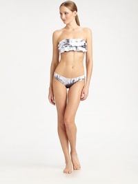 Ruffles upon romantic ruffles are the only way to go this season.Bandeau topBack tie closureFully lined92% polyester/8% elastaneHand washImported Please note: Bikini bottom sold separately. Ruffles upon romantic ruffles are the only way to go this season.Bandeau topBack tie closureFully lined92% polyester/8% elastaneHand washImported Please note: Bikini bottom sold separately.