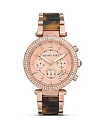 Rich rose gold and tortoise are all dressed up on MICHAEL Michael Kors' round watch. Take your cues from all-American style with this timeless ticker. Rich rose gold and tortoise are all dressed up on MICHAEL Michael Kors' round watch. Take your cues from all-American style with this timeless ticker.