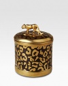 A candle with the invigorating scent of Vetiver D'Orient, encased in a cylinder of fine Limoges porcelain with golden leopard spots. Includes a fitted lid sculpted from 14k gold in the shape of a leopard. Handcrafted porcelain 4¾H X 5 diam. Imported 