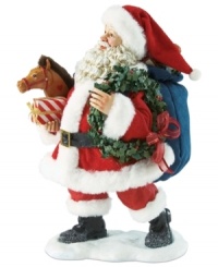 Here Comes Santa Claus! Celebrate the arrival of jolly old Saint Nicholas with this festive figurine featuring Santa and his bag of gifts. Here Comes Santa Claus! Celebrate the arrival of jolly old Saint Nicholas with this festive figurine featuring Santa and his bag of gifts.