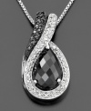 Deep intrigue surrounds this beautiful pendant featuring pear-shaped onyx and round-cut diamonds (1/7 ct. t.w.) set in sterling silver. Approximate length: 18 inches. Approximate drop: 1 inch.