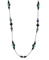 Keep everyone on their toes. Prismatic aurora borealis crystal beads and black lantern beads glitter and dance on this extra-long hematite-plated necklace by 2028. Double it up or wear as one long strand. Crafted in mixed metal. Approximate length: 42 inches.