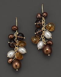 A cluster of cultured pearls and gleaming gemstones dangle from 14K yellow gold settings. A cluster of cultured pearls and gleaming gemstones dangle from 14K yellow gold settings.