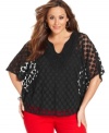 Get spot-on style with Alfani's butterfly sleeve plus size top, showcasing a sheer polka-dot pattern.