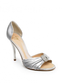 THE LOOKMetallic leather Slip-on stylePeep-toe silhouetteGathered front strap with rhinestone and metal detailTHE FITHeel 4 (100mm)THE MATERIALLeatherLeather lining and soleORIGINMade in Italy THE LOOKMetallic leather Slip-on stylePeep-toe silhouetteGathered front strap with rhinestone and metal detailTHE FITHeel 4 (100mm)THE MATERIALLeatherLeather lining and soleORIGINMade in Italy