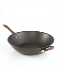 A deep, rich chocolate tone, with a superior nonstick finish and bowl-shaped high sides that keep contents in the pan and not on the floor, turns things up in the kitchen, making every meal a mixture of sophistication and ease. Constructed for professional performance with a hard-anodized construction, impact-bonded stainless steel base and dishwasher-safe finish. Lifetime warranty. A deep, rich chocolate tone, with a superior nonstick finish and bowl-shaped high sides that keep contents in the pan and not on the floor, turns things up in the kitchen, making every meal a mixture of sophistication and ease. Constructed for professional performance with a hard-anodized construction, impact-bonded stainless steel base and dishwasher-safe finish. Lifetime warranty.