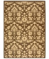 Safavieh takes classic beauty outside of the home with this elegant rug, created with a specially designed sisal weave. In deep chocolate brown with natural accents, this beautiful piece makes the most of any outdoor patio, porch or balcony. (Clearance)