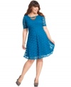 Be an image of grace in Love Squared's A-line plus size dress, featuring a lace finish.