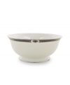 The Vintage Jewel pattern from Lenox's dinnerware and dishes collection evokes a more gracious era, combining white bone china with a dark, richly patterned band accented with subtle touches of cobalt blue.